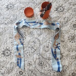 Hermes Light Blue Silk Twilly with Blue and Gold Equestrian Print